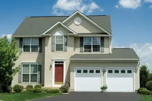 Home featuring Raynor Trademark garage doors