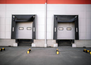Warehouse exterior with two garage doors