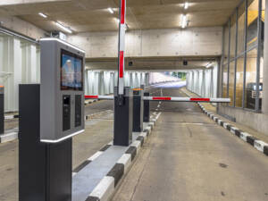 Underground parking garage with lifted barrier arm