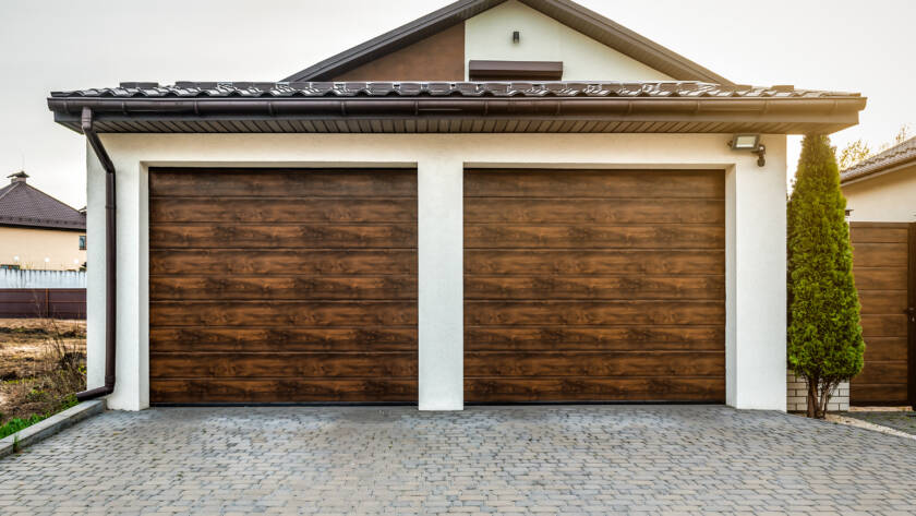Luxury home with two upscale garage doors