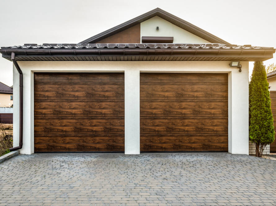 Luxury home with two upscale garage doors