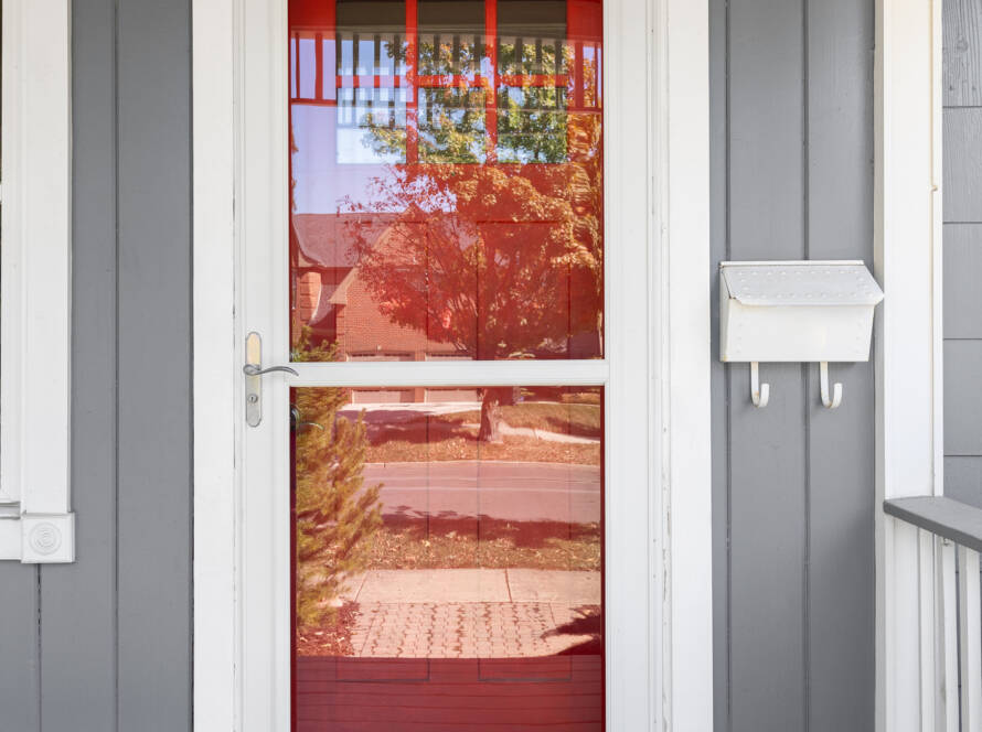 Glass storm door